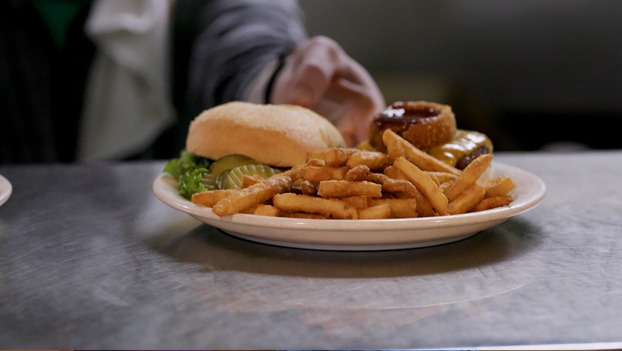 Hamburger and french fries on a plate